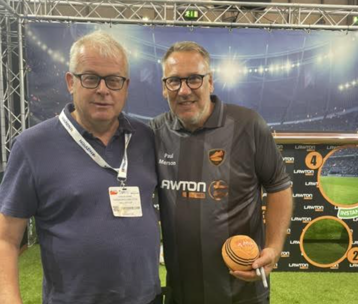 BAL Group Managing Director Steve Kane meeting former England football international Paul Merson at the Lawton Tubes stand during the InstallerSHOW exhibition at the NEC Birmingham